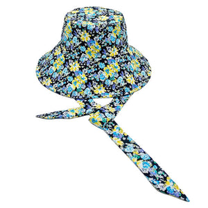 Navy Flower Patterned Chin Tie Bucket Hat. Let your love for Summer bloom with these Bucket Hat. Packable and super convenient to carry, can also be easily carried inside your bags. Perfect for protecting you on a hot Summer day at the beach or keeping cool on the streets all while having your style completely intact!