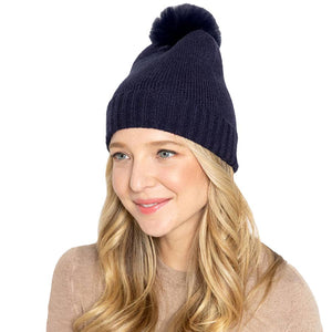 Navy Solid Knit Beanie Hat With Faux Fur Pom, accessorize the fun way with this faux fur pom solid knit beanie hat to keep yourself warm and toasty and enrich your beauty with luxe. The autumnal touch you need to finish your outfit in style. Awesome winter gift accessory! Perfect Gift for Birthdays, Christmas, holidays, anniversaries, and Valentine’s Day to your friends, family, and Loved Ones. 