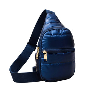 Navy Solid Puffer Mini Sling Bag, be the ultimate fashionista while carrying this Solid Puffer Sling bag in style. It's great for carrying small and handy things. Keep your keys handy & ready for opening doors as soon as you arrive. The adjustable lightweight features room to carry what you need for long walks or trips.
