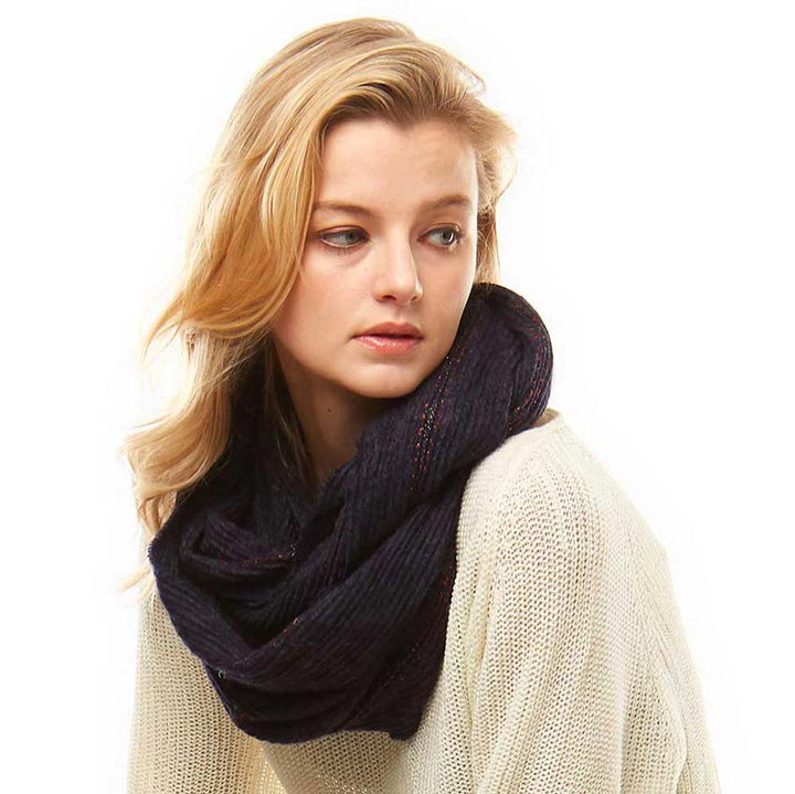 Navy Stripe Textured Boucle Infinity Scarf, makes your beauty more enriched with a classy look. Great to wear daily in the cold winter to protect you against the chill. It amps up the glamour with a plush material that feels amazing snuggled up against your cheeks. It gives a lot of options to dress up your attire. It goes well with any outfit from jeans and a tee to work trousers and a sweater. Feel warm, comfortable and smart at any place, any time.