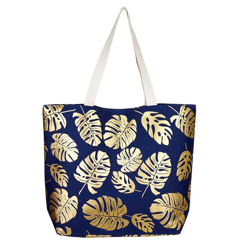 Navy Tropical Leaves Foil Beach Bag, Show your trendy side with this awesome Flower & Leaf beach tote bag. Spacious enough for carrying any and all of your seaside essentials. The soft rope straps really helps carrying this shoulder bag comfortably. Folds flat for easy packing. Perfect as a beach bag to carry foods, drinks, big beach blanket, towels, swimsuit, toys, flip flops, sun screen and more.