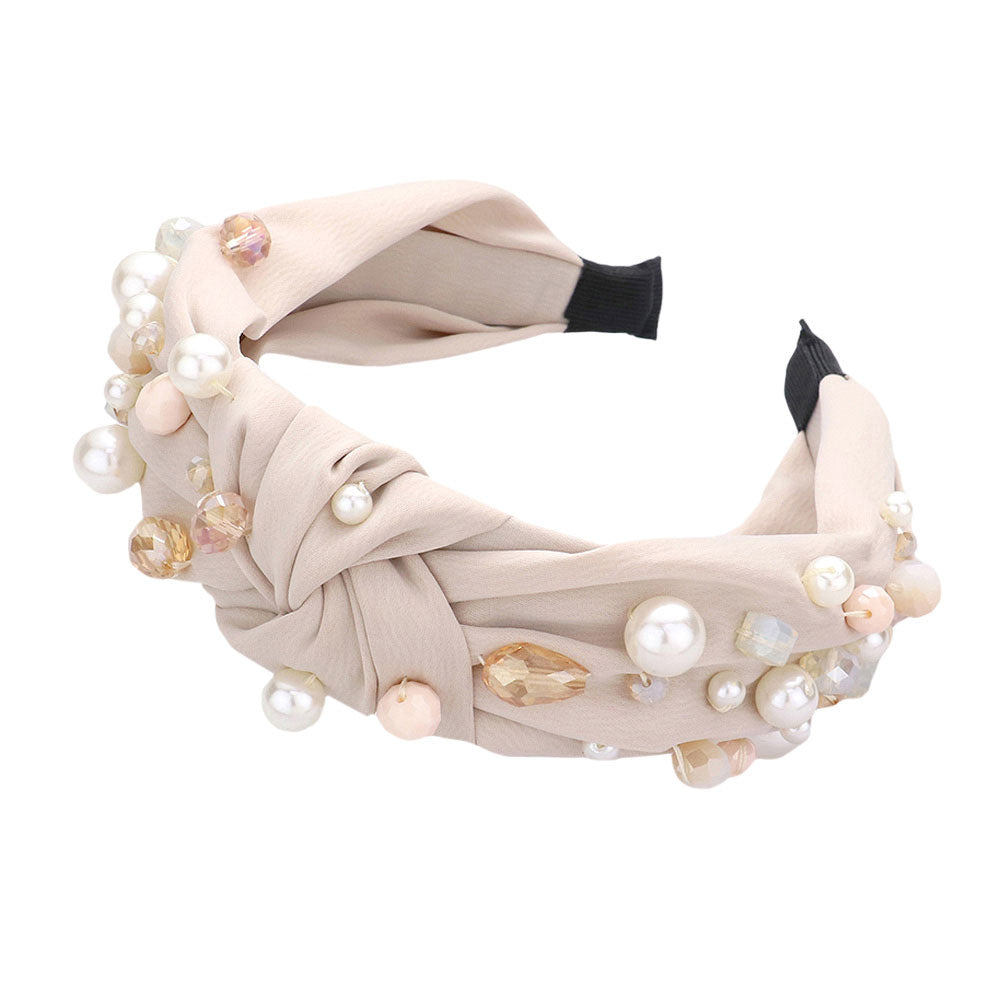 Neutral Pearl Multi Bead Embellished Knot Burnout Headband, create a beautiful look while perfectly matching your color with the easy-to-use pearl multi bead knot burnout headband. These are beautifully designed on a knot and pearl theme to put on a pop of color and complete your ensemble.