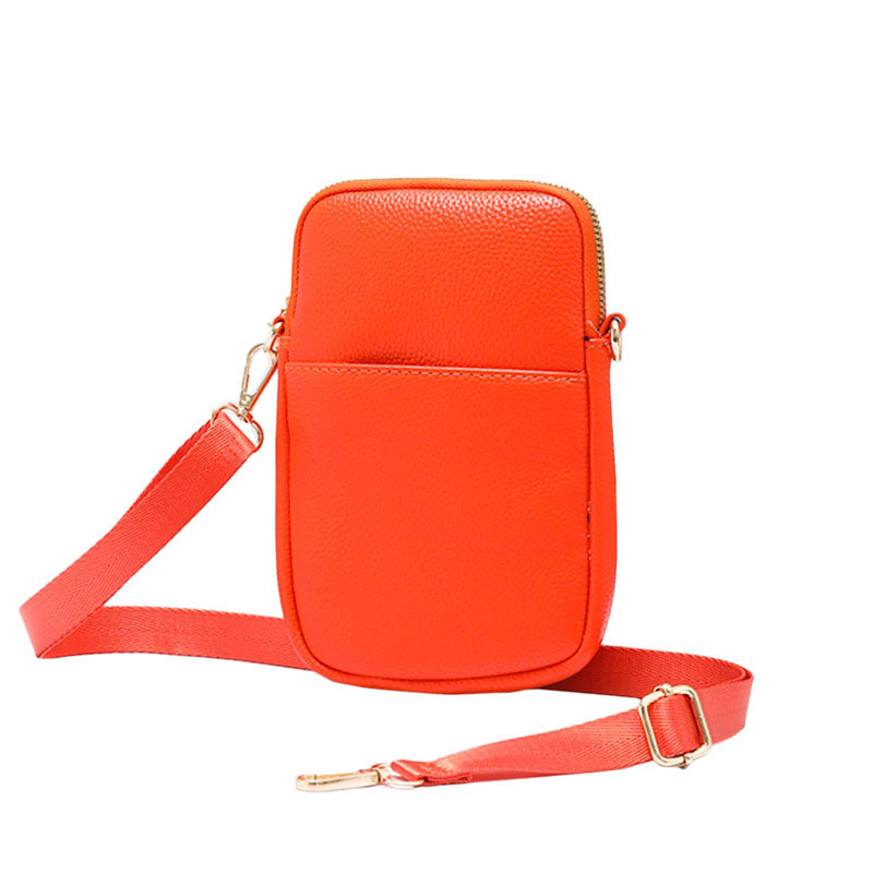 Orange Faux Leather Rectangle Crossbody Bag, This high-quality faux leather fashion crossbody features one front slip pocket and one inside slip pocket, and secured zipper closure at the top, this bag will be your new go-to! These beautiful and trendy Crossbody bag have adjustable and detachable hand straps that make your life more comfortable. This Simple fashion design crossbody bag for women keep your hands free while shopping, dating, traveling, and in outdoor sport. 