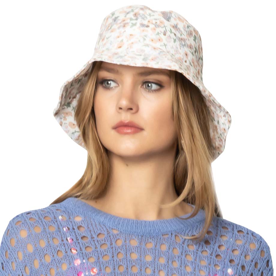 Light Blue Flower Patterned Bucket Hat, Before running out the door under the sun, you’ll want to reach for this flower-patterned bucket hat for comfort & beauty. Perfect for that bad hair day, or simply casual everyday wear. It's the perfect outfit in style while on a beach, on a tour, outing, or party.