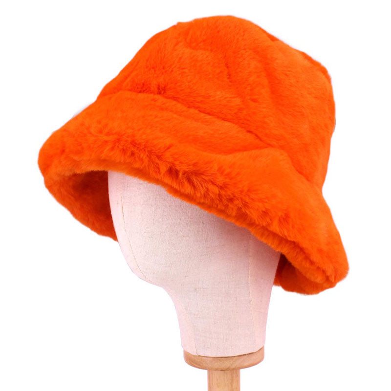 Orange Polyester Faux Fur Bucket Hat, stay warm and cozy, protect yourself from the cold, this most recongizable look with remarkable bold, soft & chic bucket hat, features a rounded design with a short brim. The hat is foldable, great for daytime. Perfect Gift for cold weather!