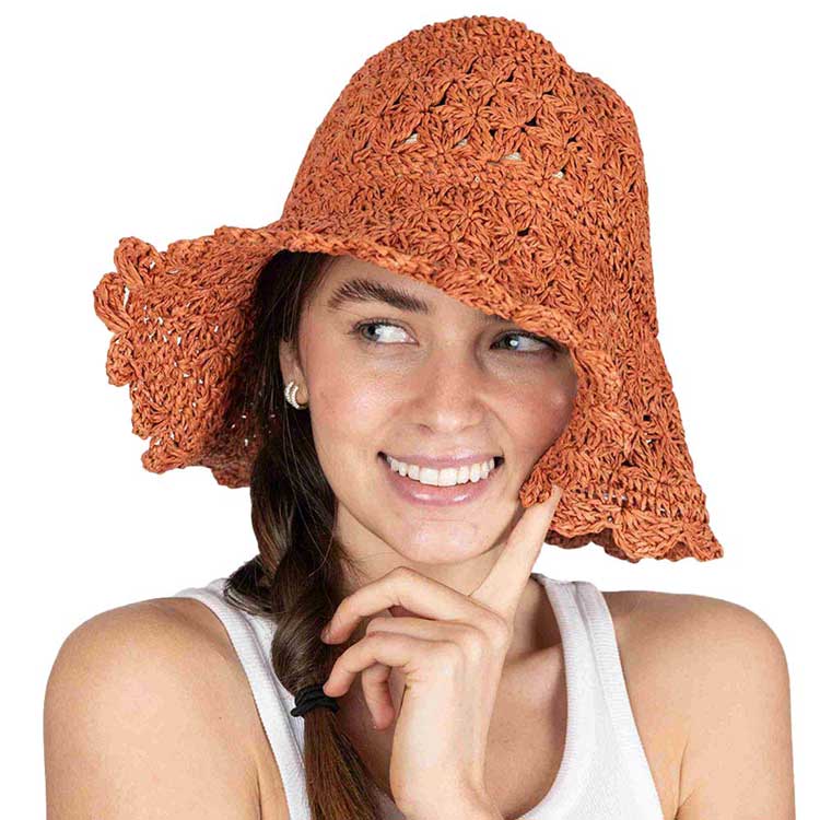 Orange Raffia Crochet Sun Hat, This raffia crochet sun hat features a large brim and a lovely textured hat bucket. The wide brim provides a perfect shade to your face, protecting you from the sun. Not only functional but very stylish, the Raffie Sun Hat will give your outfit an individual, elegant touch. This crochet sun hat is perfect for the beach, but also for gardening and hiking and the best thing is that it's also travel-friendly.