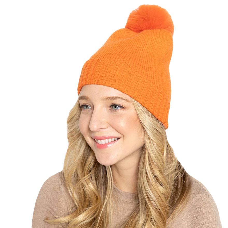 Orange Solid Knit Beanie Hat With Faux Fur Pom, accessorize the fun way with this faux fur pom solid knit beanie hat to keep yourself warm and toasty and enrich your beauty with luxe. The autumnal touch you need to finish your outfit in style. Awesome winter gift accessory! Perfect Gift for Birthdays, Christmas, holidays, anniversaries, and Valentine’s Day to your friends, family, and Loved Ones. 