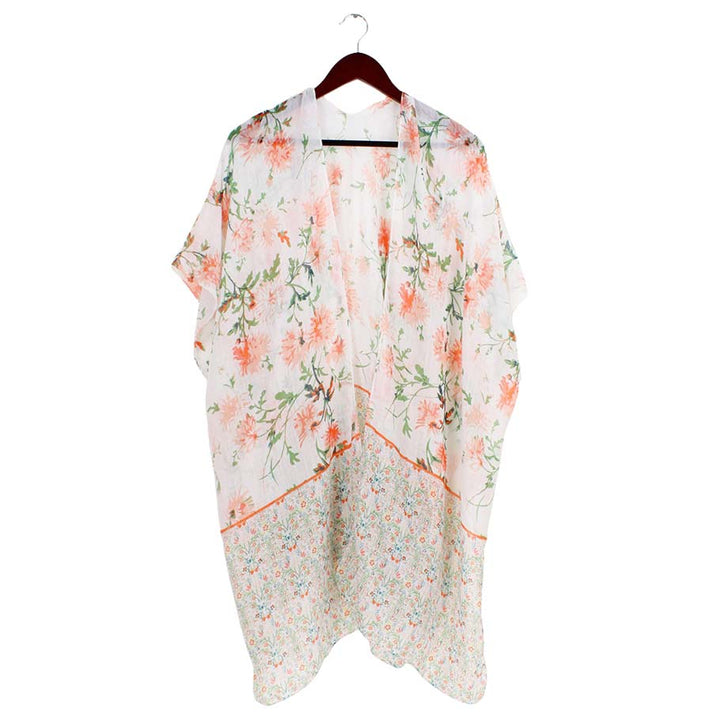 Peach Mint Flower Patterned Cover Up Kimono Poncho, beautifully flower-patterned Poncho is made of soft and breathable material that amps up your real and gorgeous look with a perfect attraction anywhere, anytime. Its eye-catchy design makes you stand out. Coordinate this cover-up kimono with any ensemble to finish in perfect style and get ready to receive beautiful compliments.