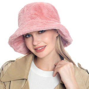 Peach Trendy & Fashionable Winter Faux Fur Solid Bucket Hat. Before running out the door into the cool air, you’ll want to reach for this toasty beanie to keep you incredibly warm. Accessorize the fun way with this beanie hat, it's the autumnal touch you need to finish your outfit in style. Awesome winter gift accessory!