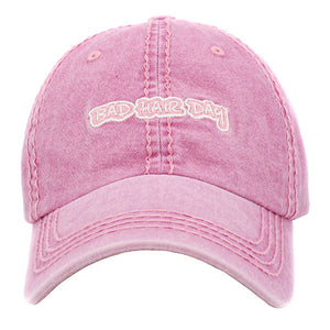 Pink BAD HAIR DAY Vintage Baseball Cap. Fun cool message themed vintage baseball cap. Perfect for walks in sun, great for a bad hair day. The distressed frayed style with faded color gives it an awesome vintage look. Soft textured, embroidered message with fun statement will become your favorite cap.