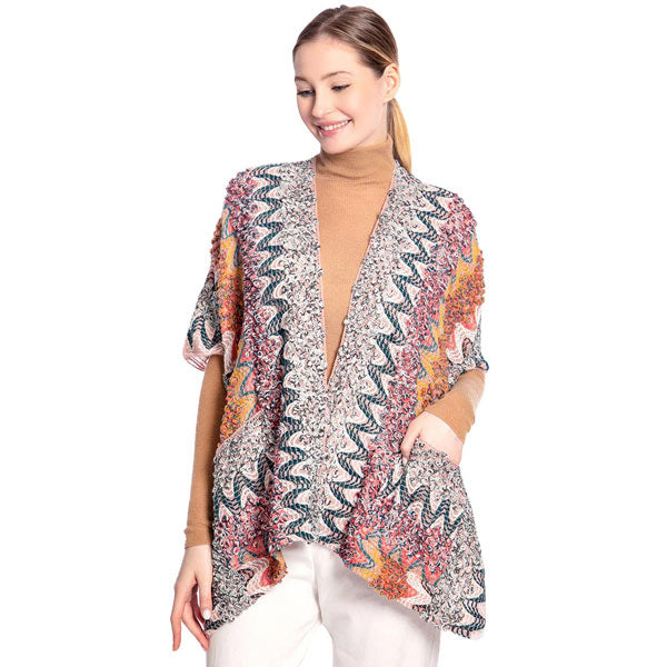 Pink Boho Patterned Front Pocket Ruana,  is the perfect accessory to represent your beauty with comfortability.This boho patterned front pocket ruana isa sophisticated, flattering, and cozy poncho drapes beautifully for a relaxed, pulled-together look. A perfect gift accessory for your friends, family, and nearest and dearest ones. 