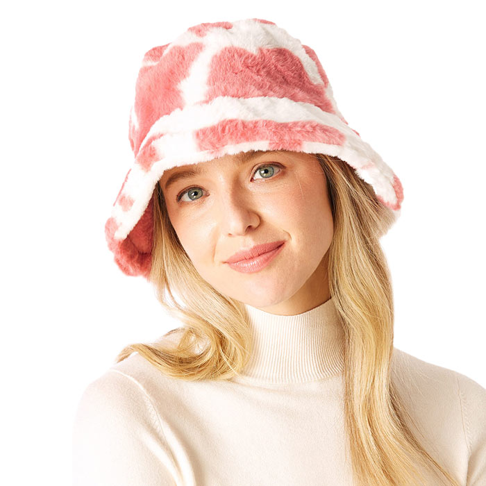 Pink Cow Patterned Faux Fur Bucket Hat, this cow patterned bucket hat is nicely designed and a great addition to your attire. Have fun and look stylish anywhere outdoors. Great for covering up when you are having a bad hair day. Perfect for protecting you from the wind, snow, beach, pool, camping, or any outdoor activities in cold weather. Amps up your outlook with confidence with this trendy bucket hat. Perfect gift for Birthdays, Christmas, Stocking stuffers, Secret Santa, holidays, etc.