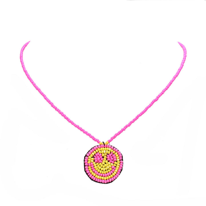 Pink Felt Back Seed Beaded Smile Pendant Necklace, this beautiful Smile-themed pendant necklace is the ultimate representation of your class & beauty.  Perfect for adding just the right amount of shine and a touch of class this any happy moments. Perfect gift for Birthdays, valentine's day & other meaningful occasions.