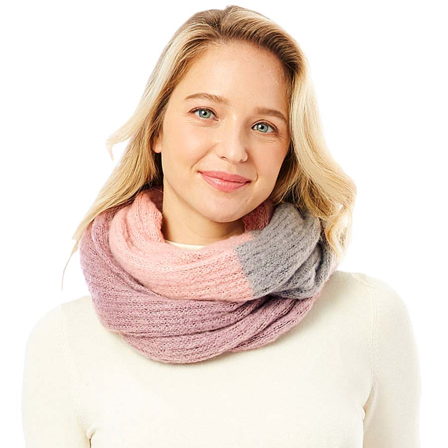 Pink Multi Color Infinity Scarf, is on trend and a beautiful scarf that amps up your beauty with comfort to a greater extent. Great to wear daily in the cold winter to protect you against the chill. It accents the glamour with a plush material that feels amazing and snuggled up against your cheeks. This scarf is a versatile choice that can be worn in many ways. 