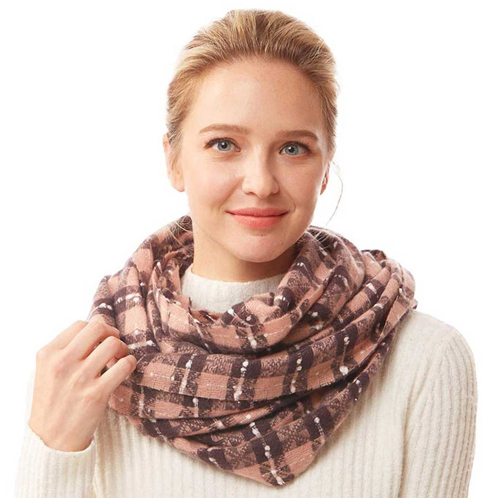 Pink Plaid Check Infinity Super Soft Scarf, is a beautiful addition to your attire. The attractive plaid pattern makes this scarf awesome to amp up your beauty to a greater extent. It perfectly adds luxe and class to your ensemble. Absolutely amplifies the glamour with a plush material that feels amazing snuggled up against your cheeks. It's a versatile choice and can be worn in many ways with any outfit. A beautiful gift for your Wife, Mom, and your beloved ones