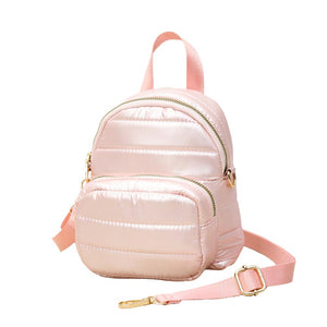 Pink  Solid Puffer Mini Backpack Bag, Great for adding fashionable accents to your daily style. This mini bag offers enough room for your daily going essentials. It can hold your wallets, keys, cell phones, makeup and other small accessories and stuff. Mini size and lovely decoration make your look chic and fashionable. These beautiful and trendy backpacks have adjustable hand straps that make your life more comfortable.