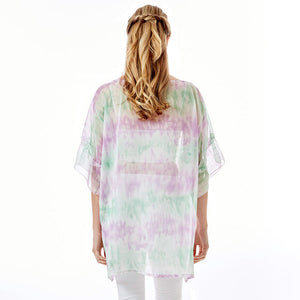 Pink Tie Dye Cover Up Poncho, When you're not feeling your outfit, it's easy than you think to change it up with this trendy classic poncho. This cover up drapes over your favorite tanks, tees, and more for added flair, and the Tie Dye print add playful movement to your look.