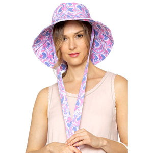 Pink Watercolored Chin Tie Bucket Hat. Show your trendy side with this chin Tie bucket hat. Have fun and look Stylish. Great for covering up when you are having a bad hair day and still looking cool. Perfect for protecting you from the sun, rain, wind, snow, beach, pool, camping or any outdoor activities.