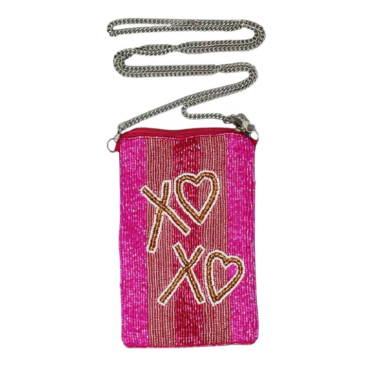 Pink Xoxo Seed Beaded Phone Purse, This attractive Purse is going to be your absolute favorite new purchase! It features a beautiful seed-beaded design with an adjustable and detachable chain strap, & upper zipper closure. Ideal for keeping your phone, money, bank cards, lipstick, coins, and other small essentials in one place. It's versatile enough to carry with different outfits throughout the week.