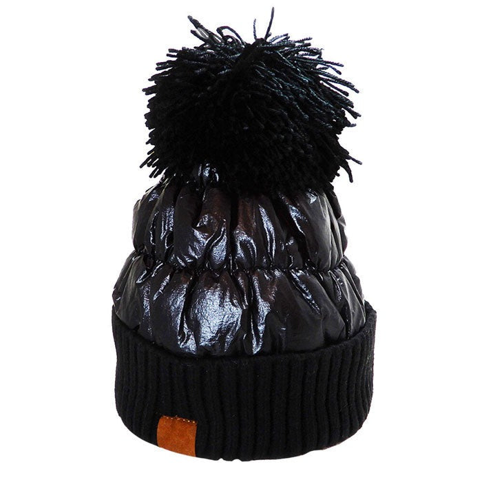 Black Puffer Knit Pom Pom Glossy Winter Cozy Beanie Hat. Before running out the door into the cool air, you’ll want to reach for this toasty beanie to keep you incredibly warm. Accessorize the fun way with this puffer knit hat, it's the autumnal touch you need to finish your outfit in style. Awesome winter gift accessory!