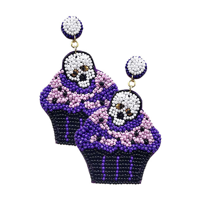 Purple Felt Back Halloween Skull Cupcake Beaded Dangle Earrings. Show your spirit with these skull cupcake dangle Halloween Earrings! Carry the spirit of Halloween with you wherever you go.The colors are vibrant and the design is a seasonal delight. This earrings can be worn for Halloween parties, cosplay, costume party, display, birthday, events, festivals, and so on, also nice for festive decorations gifts for your friend's and families.