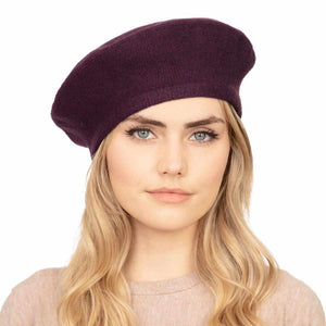 Purple Trendy Fashionable Winter Stretchy Solid Beret Hat, this Women Beret Hat Solid Color Stretchy Beret Cap doubles as a rain hat and is snug on the head and stays on well. It will work well to keep the rain off the head and out of the eyes and also the back of the neck. Wear it to lend a modern liveliness above a raincoat on trans-seasonal days in the city.