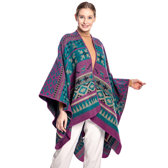 Purple Tribal Patterned Poncho, is attractively designed with tribal pattern that will surely amp up your beauty to make you stand out.  It will keep you perfectly warm and toasty everywhere saving you from cold and chill on the outside. It goes with every winter outfit and gives you a unique yet beautiful outlook everywhere. It ensures your upper body keeps perfectly toasty when the temperatures drop.