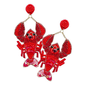 Red Felt Back Mardi Gras Seed Beaded Lobster Dangle Earrings.  Beautifully crafted design adds a gorgeous glow to your Mardi Gras outfit. With these Sea Life lobster themed earring rock every party you attend to. Surprise your loved ones on this Mardi Gras occasion, great gift idea for Wife, Mom, or your Loving One.