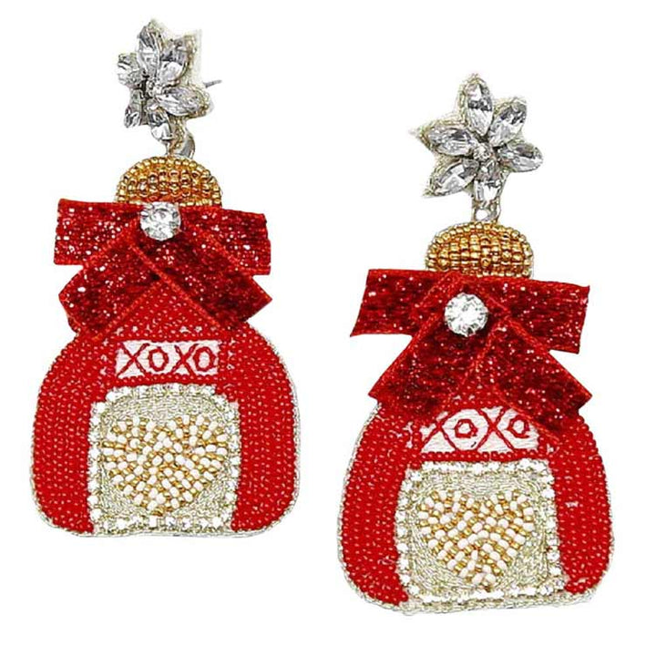 Red Love Potion Seed Bead Earrings, Look like the ultimate fashionista with these love potion Earrings! Add something special to your outfit this Valentine's! The Valentine themes heart earrings are colorful and bold, they are so light and easy to wear. Accent all of your dresses with the extra fun vibrant color with these Love Potion Seed Bead earrings.  It is so fun to be able to have lightweight cute earrings for every day of Valentine's week.