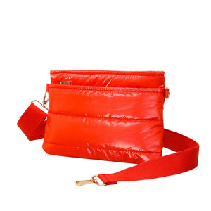 Red Glossy Solid Puffer Crossbody Bag, Complete the look of any outfit on all occasions with this Shiny Puffer Crossbody Bag. This Puffer bag offers enough room for your essentials. With a One Front Zipper Pocket, One Back Zipper Pocket, and a Zipper closure at the top, this bag will be your new go-to! The zipper closure design ensures the safety of your property. The widened shoulder straps increase comfort and reduce the pressure on the shoulder.