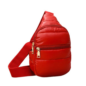 Red Solid Puffer Mini Sling Bag, be the ultimate fashionista while carrying this Solid Puffer Sling bag in style. It's great for carrying small and handy things. Keep your keys handy & ready for opening doors as soon as you arrive. The adjustable lightweight features room to carry what you need for long walks or trips.