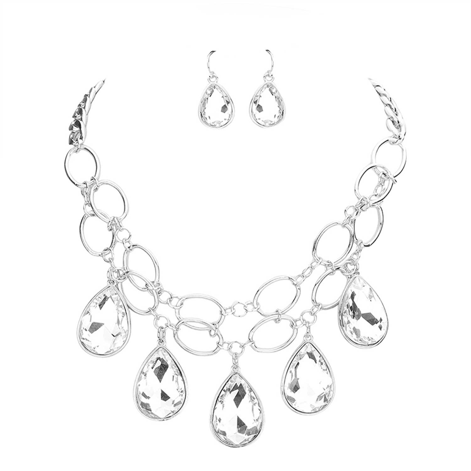 Rhodium Teardrop Stone Accented Open Metal Oval Link Evening Necklace, this gorgeous jewelry set will show your class on any special occasion. The elegance of these stones goes unmatched, great for wearing at a party! stunning jewelry set will sparkle all night long making you shine like a diamond on special occasions. Perfect jewelry to enhance your look and for wearing at parties, weddings, date nights, or any special event.