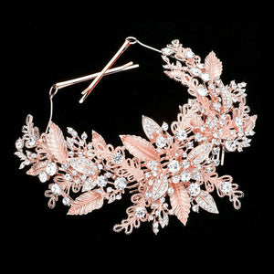 Rose Gold Stone Embellished Leaf Cluster Bun Wrap Headpiece. Keep your hairstyle as glamorous as you are with this Stone headpiece! Add spectacular sparkle into your hair do. Perfect for adding just the right amount of shimmer & shine, will add a touch of class, beauty and style to your wedding, prom, special events, embellished flower leaf cluster to keep your hair sparkling all day & all night long. 