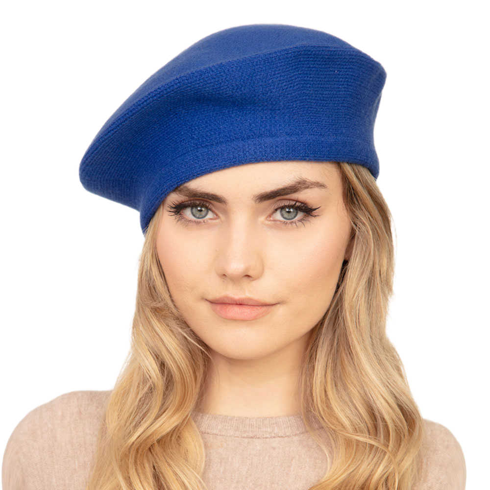 Royal Blue Trendy Fashionable Winter Stretchy Solid Beret Hat, this Women Beret Hat Solid Color Stretchy Beret Cap doubles as a rain hat and is snug on the head and stays on well. It will work well to keep the rain off the head and out of the eyes and also the back of the neck. Wear it to lend a modern liveliness above a raincoat on trans-seasonal days in the city.