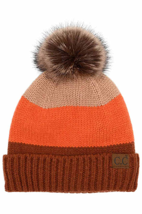 Rust C.C Multi Color Block Stripes Pom Beanie, wear it before running out the door into the cool air to keep yourself warm and toasty and look absolutely beautiful. You’ll want to reach for this toasty beanie to keep you incredibly warm everywhere and every occasion. Accessorize the fun way with this pom hat. It's the autumnal touch you need to finish your outfit in style.