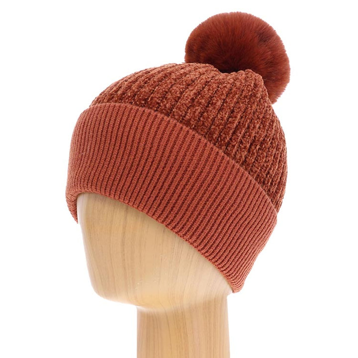 Rust Solid Knit Faux Fur Pom Pom Beanie Hat, The autumnal touch you need to finish your outfit in style. Solid knit Beanie made with warm material to ensure maximum comfort and durability. It's comfortable that will keep you perfectly warm and toasty. Ideal winter head cover! Absolutely the perfect gift winter accessory! Winter will be more comfortable with this cozy pom pom hat.