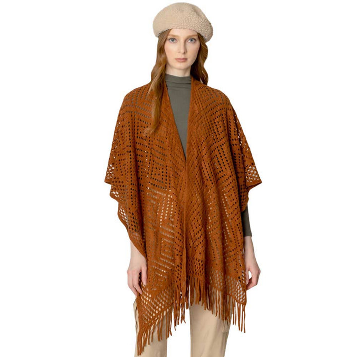 Rust Stylist Cut Out Detailed Ruana, is the perfect wear to keep you warm and toasty on winter and cold weather. Its beautiful color variation goes with every outfit and surely makes you stand out from the crowd. These timelessly beautiful ruanas feel exceptionally comfortable to wear. It goes with all your winter outfits to give you a unique yet classy outlook. You can throw it on over so many pieces elevating any casual outfit! 