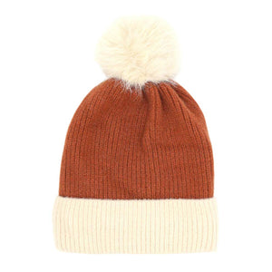 Rust Two Tone Knit Pompom Beanie Hat, wear this beautiful pompom Beanie Hat before running out the door into the cool air. It will keep you incredibly warm and toasty on cold days and winter. Accessorize the fun way with this beanie hat to not only get the warmth but also get compliments due to its eye-catchy look. It's the autumnal touch that you need to finish your outfit in style. Beautiful winter gift accessory!