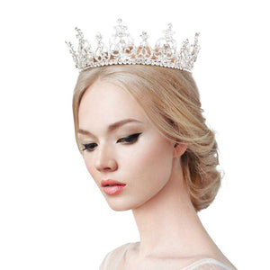 Silver Stone Embellished Crown Tiara. This tiara is a classic royal tiara made from gorgeous stone is the epitome of elegance and luxury and grace. Unique Hair Jewelry is suitable for any special occasions such as wedding, engagement, prom, evening etc. It's the most exquisite gift for the bride to be. It's the perfect complement will make your whole wedding dress look come to alive.