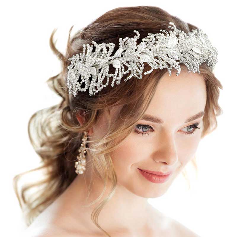 Silver Metal Leaf Rhinestone Cluster Bun Wrap Headpiece, this stunning Flower & Leaf-themed bridal headpiece is created using a glittering and beautiful Rhinestone cluster that accents the beauty to a greater extent with a classy look. Wear the headpiece for a textured lovely feel and show your perfect choice. Add spectacular sparkle to your hair, Keep your hairstyle as glamorous as you are with this Rhinestone headpiece on any special occasion.