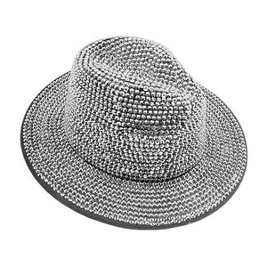 Silver Bling Studded Panama Hat, extends your classy look with bling stone that is the perfect addition of luxe. Perfect protection from sunlight even when the Sun is high. An excellent choice for going out for traveling, beach parties, fun times out, and spending leisure time. It keeps the sun off your face, neck, and shoulders. This hat will soon be a favorite accessory that goes with you everywhere to draw attention and receive compliments. Stay gorgeous and classy!