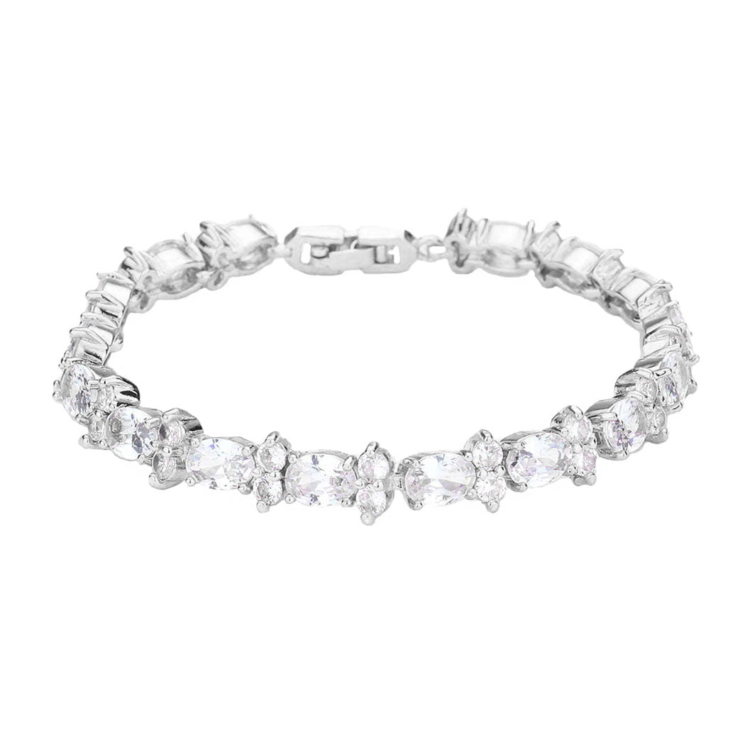 Silver CZ Round Oval Cluster Evening Bracelet. With its elegant design, this bracelet adds a feminine accent to any style. Pair it with your casual or formal attire. Get ready with these bright stunning fashion bracelets, put on a pop of shine to complete your ensemble. These CZ cluster bracelets are perfect for Party, Wedding and Evening.