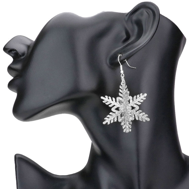 Silver Sparkle Snowflake Dangle Earrings, beautifully crafted design adds a gorgeous glow to any outfit with Christmas theme. Get into the Christmas spirit with our gorgeous Christmas Snowflake dangle earrings with perfect style. Bright snowflake design with different colors and pattern will make the perfect choice to your Christmas costumes. Ideal gift for you loved ones, girlfriend, wife, daughter, sisters, etc. Share joy and beauty with your family on Christmas.