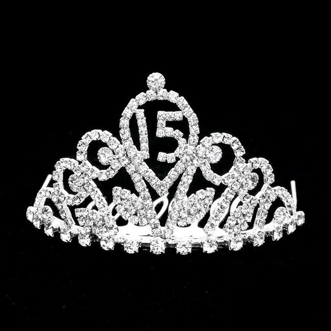 Silver Sweet 15 Rhinestone Princess Mini Tiara. This princess mini tiara is a classic royal tiara made from gorgeous rhinestone is the epitome of elegance, luxury and grace. Most stylish number 15 design with impeccable craftsmanship without fading. Match for any suit. Stay in Place; Side combs at each end of the tiara for securely fixation with hair. Profound Memory: Capture all her royal glory all day long as she celebrates her special day. Can be kept as a keepsake for years to come.