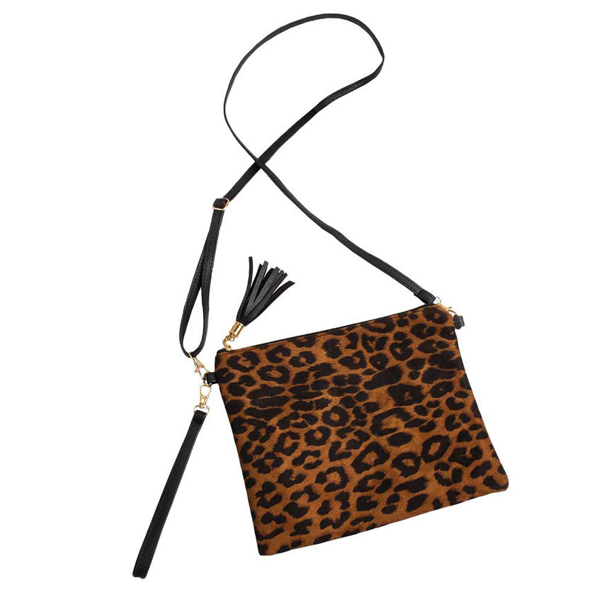 Tan Leopard Print Crossbody Clutch Bag. Be the ultimate fashionista carrying this trendy crossbody clutch bag! great for when you need something small to carry or drop in your bag. perfect for the festive season, embrace the Leopard themed spirit with these bag, these pretty  gift Crossbody Bags are sure to bring a smile to your face.