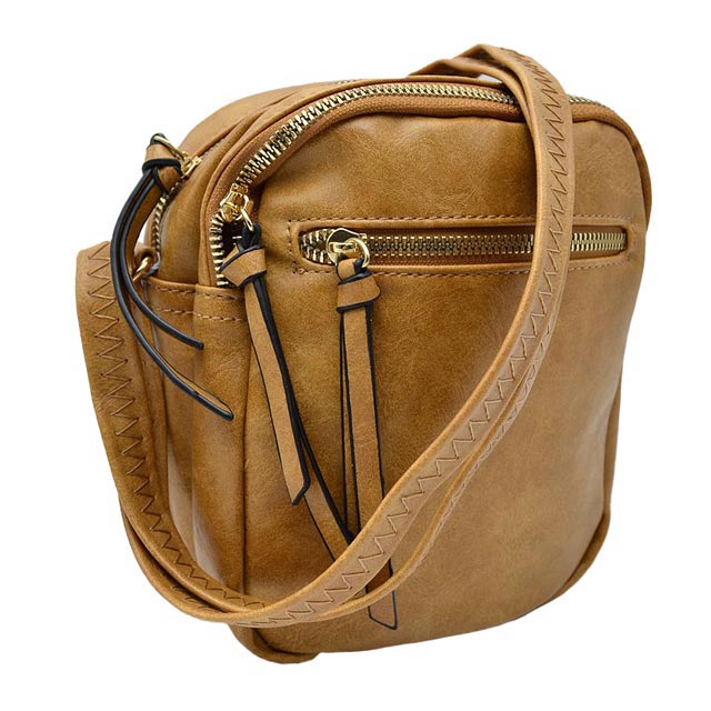 Tan Trendy Leather Crossbody Bag With Shoulder Strap, Be trendy and casual with this beautifully crafted crossbody bag. This premium-looking bag is made up of genuine leather, making it perfect for carrying when heading to the office or casual parties. This bag features a flexible shoulder strap and zipper closure and has spacious space to place all your stuff. Stay trendy!
