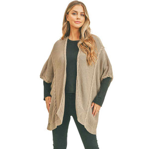 Taupe Braided Trim Lined Kimono, is the perfect accessory to represent your beauty with comfortability. From stylish layering camis to relaxed tees, you can throw it on over so many pieces elevating any outfit! This sophisticated, flattering, and cozy kimono drapes beautifully for a relaxed, pulled-together look. A perfect gift accessory for your friends, family, and nearest and dearest ones.