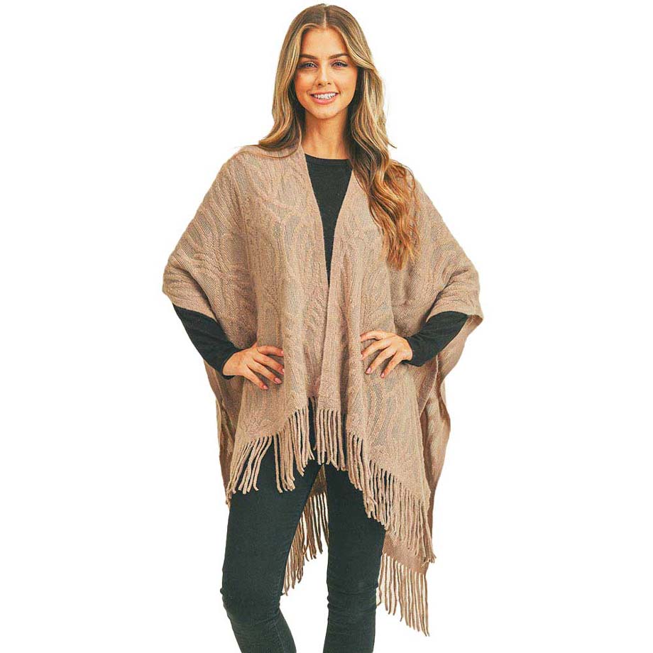 Taupe Embossed Pattern Tassel Ruana, beautifully decorated with embossed style and in different colors to accent the gorgeous look in a classy manner. It's the perfect accessory for the winter while running out the door into the cold air. It's a luxurious, trendy, super soft chic capelet that keeps you warm and toasty. You can throw it on over so many pieces elevating any casual outfit! Perfect Gift for Wife, Mom, Birthday, Holiday, Christmas, Anniversary, Fun Night Out.