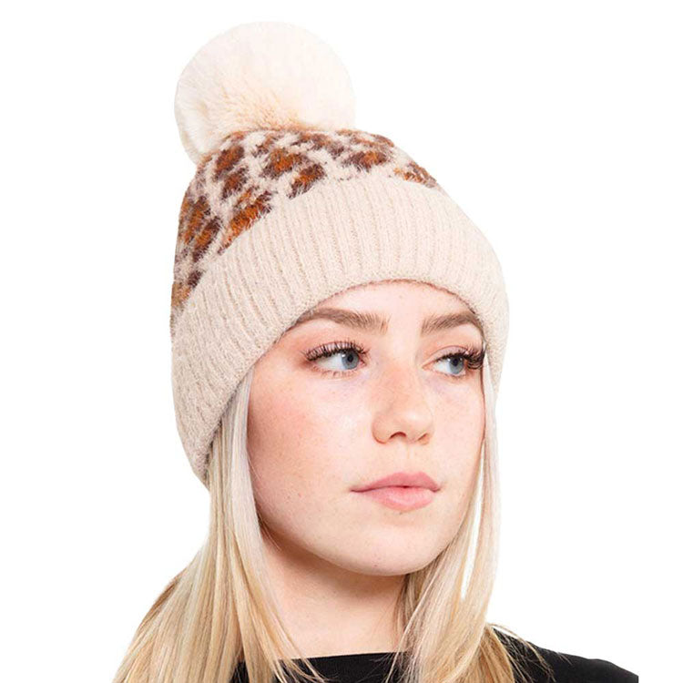 Ivory Leopard Patterned Fuzzy Fleece Pom Pom Beanie Hat. The winter hats for women is made of high-quality material, safe and harmless, soft, warm, breathable and comfortable to wear. Accessorize the fun way with this leopard themed pom pom beanie hat, the autumnal touch you need to finish your outfit in style. Awesome winter gift accessory! Perfect Gift Birthday, Christmas, Holiday, Anniversary, Valentine’s Day, Loved One.