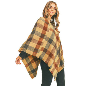 Taupe Multi Color Checker Poncho, ensure your upper body stays perfectly toasty when the temperatures drop, timelessly beautiful, gently nestles around the neck and feels exceptionally comfortable to wear this multi color checker poncho. A fashionable eye catcher, will quickly become one of your favorite accessories, warm and goes with all your winter outfits.